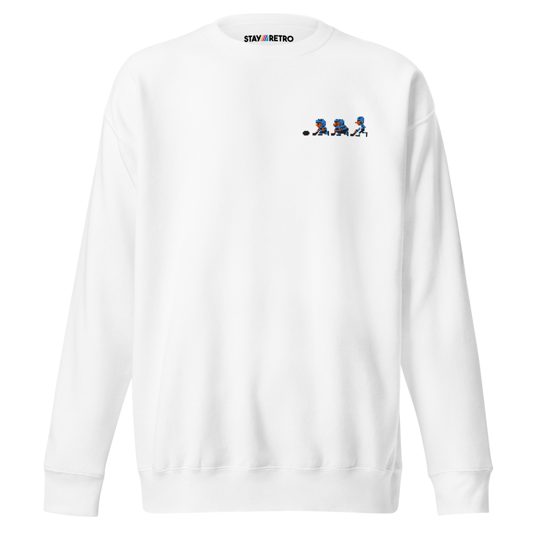 White sweatshirt with small graphic design on the chest against a white background