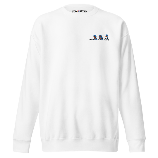White sweatshirt with small graphic design on the chest against a white background